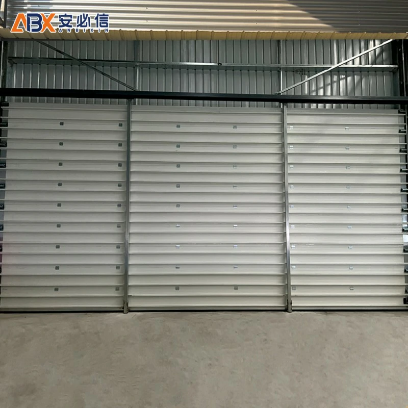 四平分节式提升门